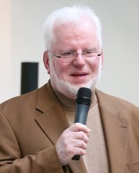 Dieter Krowatscheck hält einen Vortrag auf dem Kinderkongress 2009